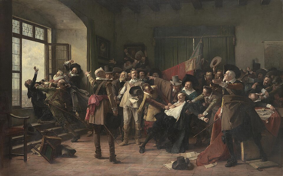 A large oil painting depicting the Defenestration of Prague in 1618. Inside a richly decorated stone-walled hall of Prague Castle, Protestant nobles in 17th-century clothing are shown forcibly pushing two Catholic regents toward an open arched window, with a third figure already in the act of falling out. Light streams in from the window; an overturned chair lies on the foreground floor; documents and an inkwell are scattered across a heavy desk.